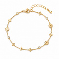 Gold Plated Charm Bracelet – Elegant Floral & Crystal Design